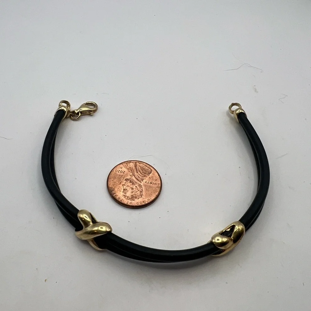 KA 1772 925 Italy Double strand leather bracelet with gold tone Accents.